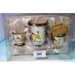 A mid-20th century EPNS 'Thermikolor' christening set by Walt Disney Productions