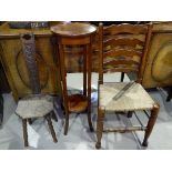 An early 20th carved oak spinning chair; a rush seat chair; a 2 tier plant stand
