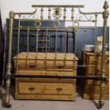 A large Victorian brass rail bed head with lion mask mount and turned column