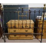 A Victorian brass and cast iron double bed head