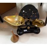 A Victorian style pair of brass and iron kitchen scales; a vintage Bush radio