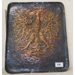A rectangular beaten copper wall plaque with eagle embossed motif 14"