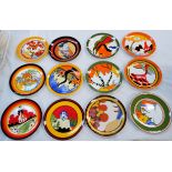 Twelve Wedgwood limited edition plates with designs after Clarice Cliff, diameter 8"