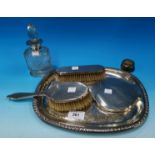 An Art Deco silver back 3 piece dressing table set