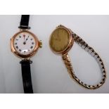 An early 20th century ladies Rolex wristwatch, 9 carat hallmarked gold, with white enamel dial and