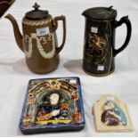 A brown Jasperware coffee pot, pewter mount; a similar jug; 2 pottery wall plaques