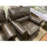 A large 3 / 4 seater dark brown leather sofa and similar armchair