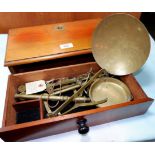 A 19th century mahogany cased portable brass apothecary scales, with weights, width 14"