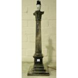 An early 20th century Corinthian column table lamp on stepped base