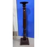 A 19th century turned mahogany torchère; a mahogany reproduction square top occasional table; 2