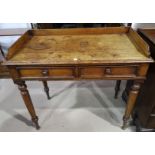 A Victorian mahogany side table/washstand with low gallery and 2 frieze drawers, on turned legs