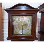 An early 20th century mahogany longcase clock with bevelled glass to pendulum door, the 8 day 3