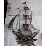 A wrought metal galleon; a similar wall mounted ship