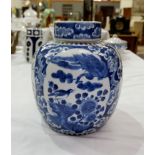 A 19th century Chinese large blue and white ginger jar decorated with dragons and clouds, the