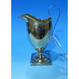 A Georgian silver cream jug with bright cut decoration, square pedestal foot, Nathaniel Smith &