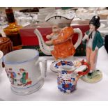 A Staffordshire double sided figure: 'Gin' & 'Water'; a 19th century frog mug; a Toby jug teapot (