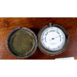 An originally cased silver plated pocket barometer by A. Franks Manchester