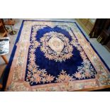 A Chinese large Aubusson pattern carpet with blue ground, 108" x 148"