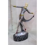 An Art Deco female dancing figure signed 'Lorenzl', silvered metal with red/gold highlights, ivorine