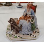 A large Capodimonte group: lady with child and spinning wheel, length 12"