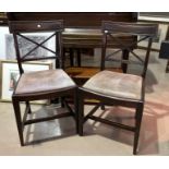 An early 20th century set of 4 stained mahogany dining chairs on square legs