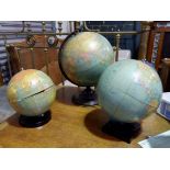 A large table globe and two smaller