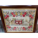 A 19th century rosewood framed embroidered picture of a house bordered by roses and flowers 24''