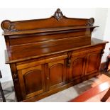 A mahogany Victorian style 4 door sideboard with 4 frieze drawers, raised back with display shelf