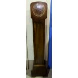 A 1930's oak cased Smith's granddaughter clock with chiming movement