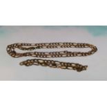 A yellow metal chain necklace and bracelet of triple elongated flattened curb links, stamped '