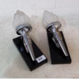 A pair of Art Deco chrome wall torchers with frosted glass flame shades height 10"