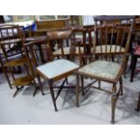 An Edwardian inlaid wood corner chair and a stick back bedroom chair