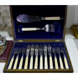 A silver plate set of fish knives, forks and servers for 6, cased; a silver plated 3 piece tea