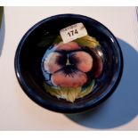 A Moorcroft pansy pattern dish,