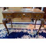 A carved burr walnut side table in the manner of Epstein, with 3 frieze drawers