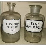 A 19th century continental large pharmacy paraffin oil jar; a similar powder jar, 13¼"