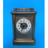 A 19th century brass carriage clock with gilt and cream dial and timepiece movement, height 5"