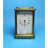 A 19th century brass carriage clock with timepiece movement and white enamel dial, lettered '