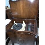 A 1950's Monarch BSR radiogram in burr walnut case