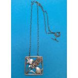 A Danish sterling silver pendant designed by Arno Malinowski for Georg Jensen, two birds with