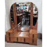 An Art Deco light oak dressing table, chrome mounts with electric lights and plate glass centre