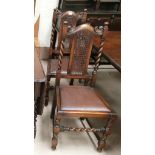 A set of 4 Carolean style dining chairs with cane backs, on barley twist legs