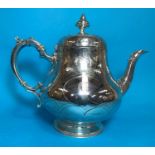 A Victorian silver pear shaped teapot, with chased decoration, monogrammed, London 1856, 27 oz