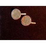 A pair of half sovereign cuff links, 1901, in clip on 9 carat hallmarked gold mounts, 19.8gm gross