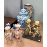 A selection of oriental vases and figures etc