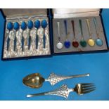 A set of 6 Danish colour enamelled silver gilt coffee spoons, import marks; a similar set and a pair