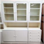 A modern white laminate display cupboard with 2 glazed doors and base cupboards; a similar single