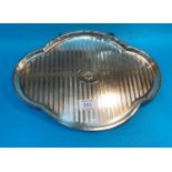 A silver shaped oval dressing table tray, engine turned and monogrammed, Birmingham 1916, 10 oz
