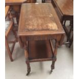 A 1930's oak 2 tier tea drop leaf trolley oak