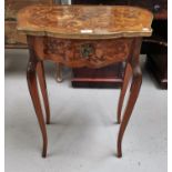 A late 19th / early 20th century Louis XV style marquetry work bijouterie cabinet with shaped